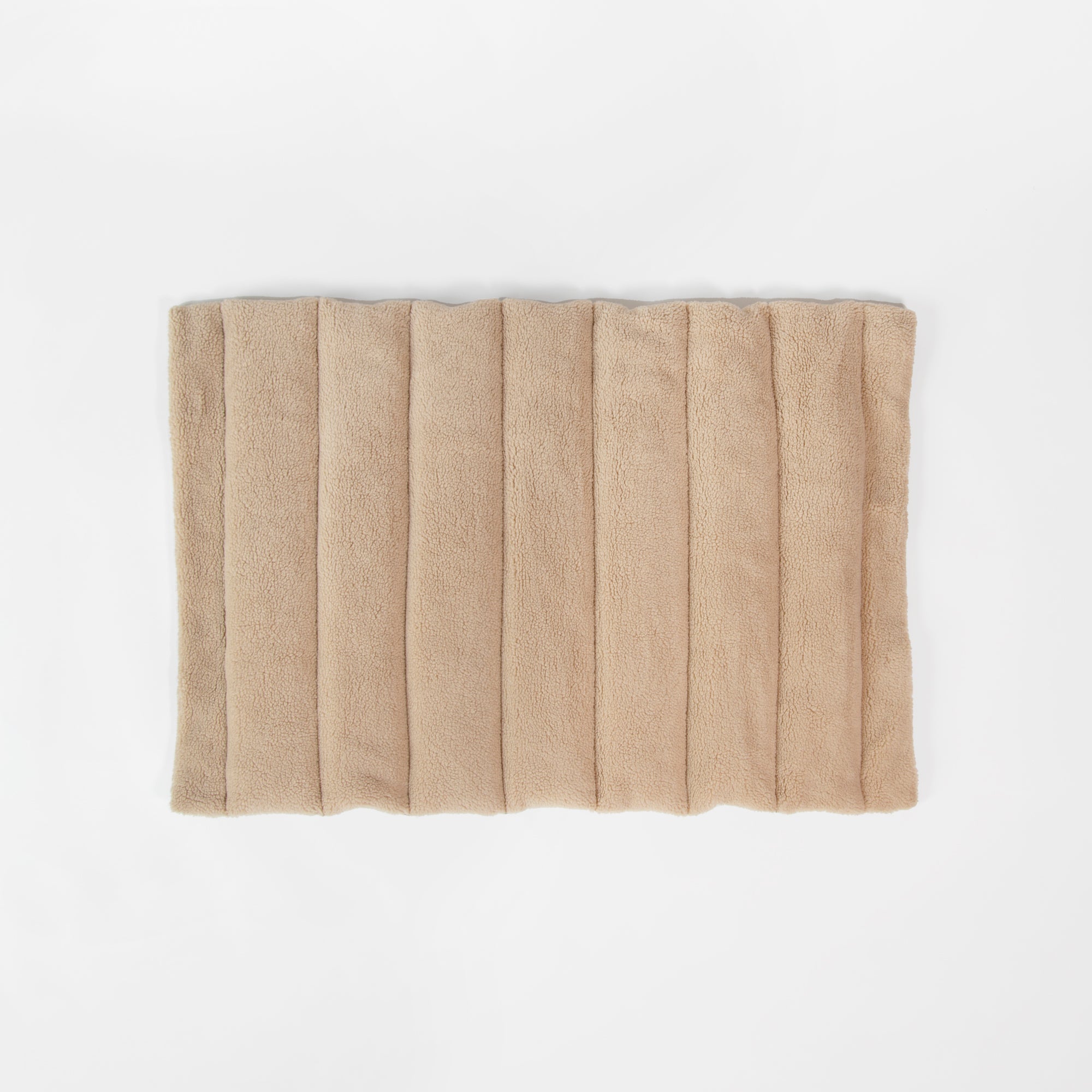 Flat-lay of Nooee Pet Jack Mat showing the plush beige sherpa side, designed for warmth and comfort.