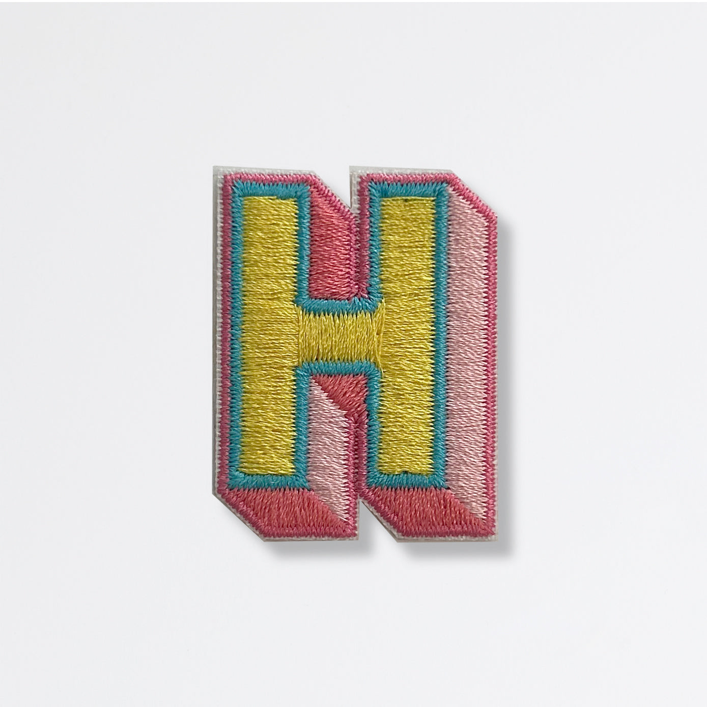 Nooee Pet embroidered patch – letter H in yellow and pink