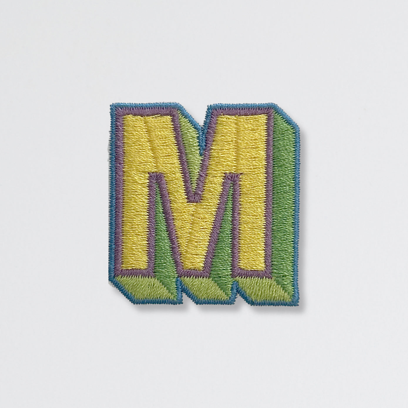 Nooee Pet embroidered patch – letter M in yellow and green