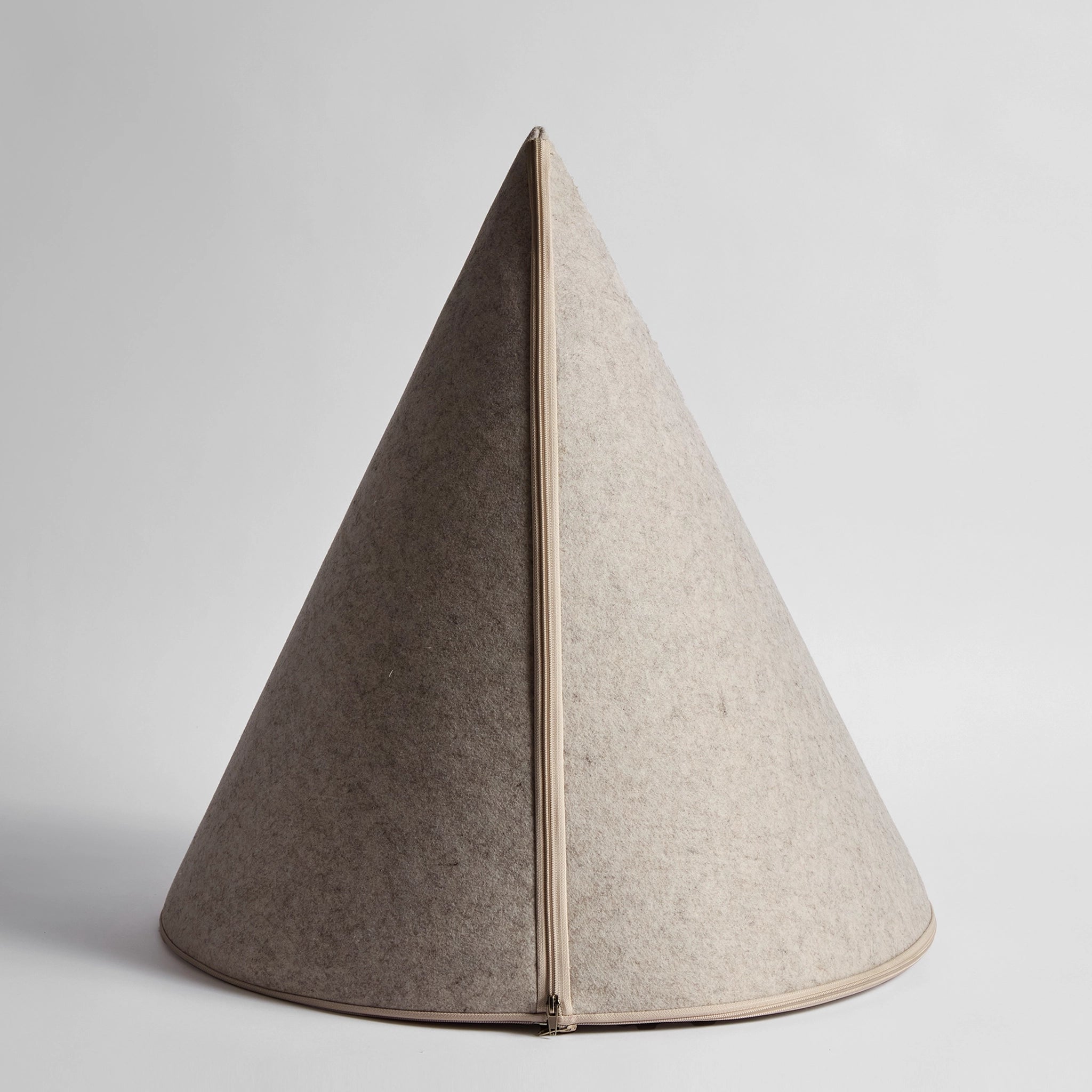 Rear view of Nooee Pet Molly XL Cream Pet Cave, highlighting its seamless conical shape and durable felt material."