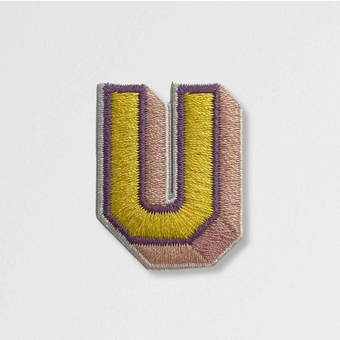 Nooee Pet embroidered patch – letter U in yellow and light pink