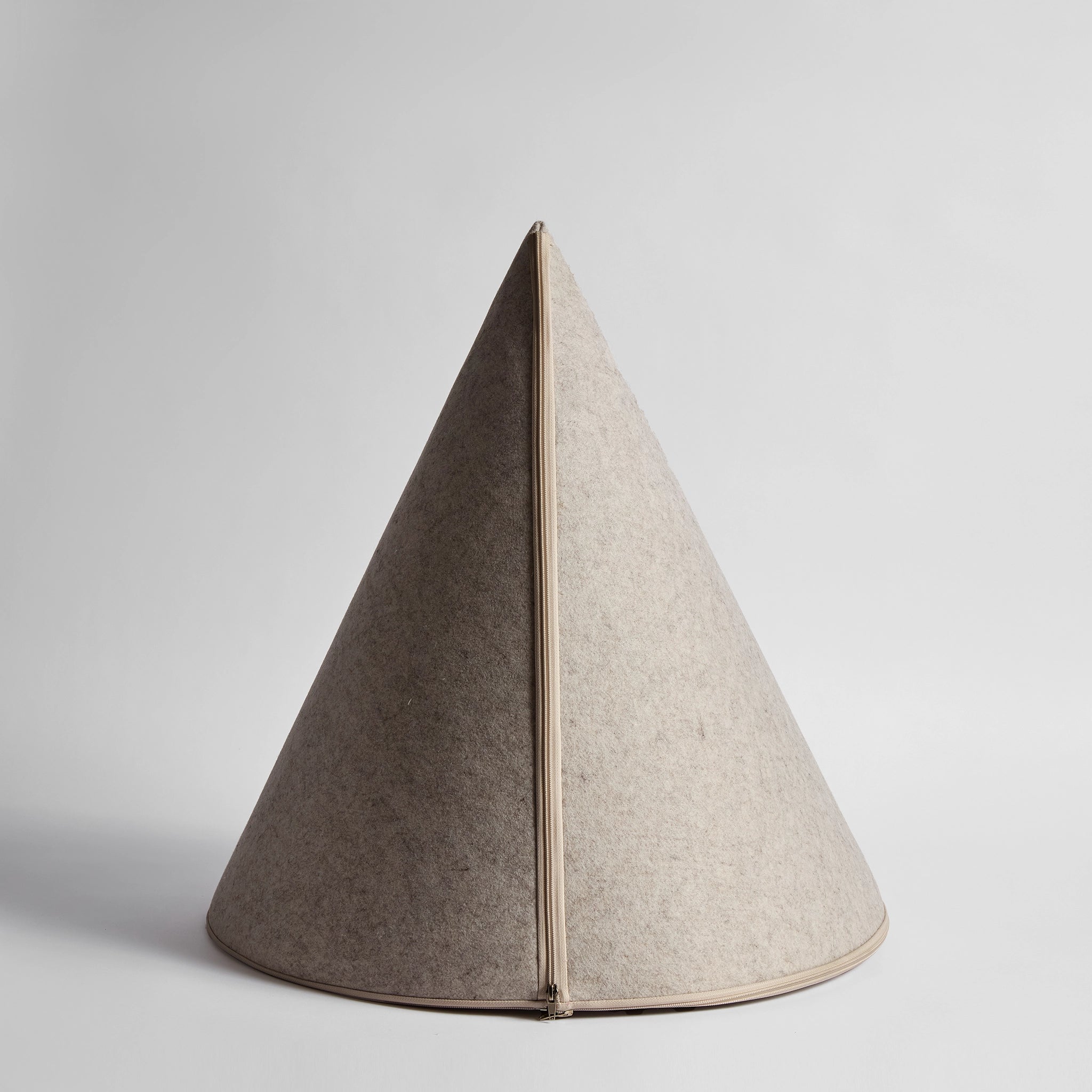 Rear view of the Nooee Pet Buddy Cave in Cream, showcasing its conical shape.
