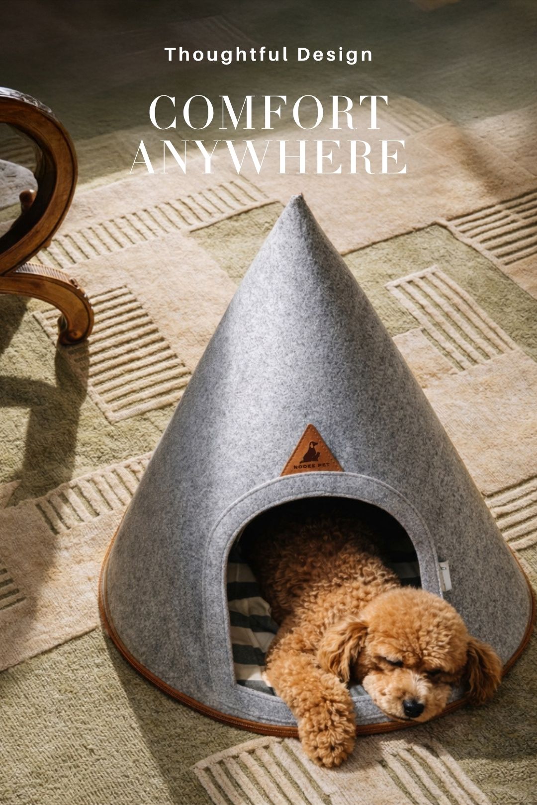 Nooee Pet Felt pet cave with dog resting inside in a warm, sunlit interior