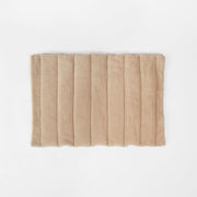 Flat-lay of Nooee Pet Jack Mat showing the plush beige sherpa side, designed for warmth and comfort.