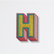 Nooee Pet embroidered patch – letter H in yellow and pink