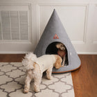 Two small dogs with the gray Nooee Pet Harry felt dog cave bed