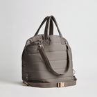 Back view of the Nooee Pet Lola Car Seat in modern gray nylon, showing adjustable bottom strap with buckle, padded top handles, and shoulder strap with silver hardware.