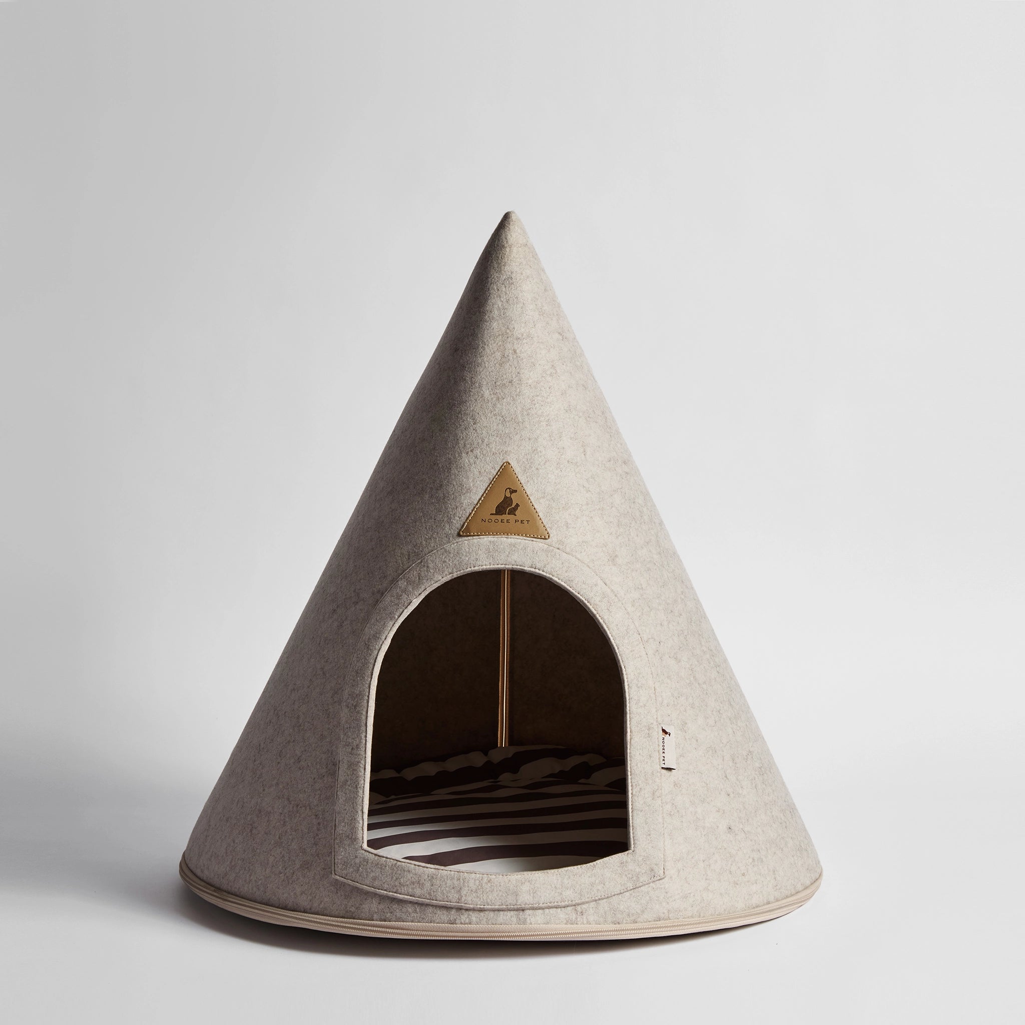 Front view of Nooee Pet Cave Lucy (M) in Cream, a modern conical dog bed.