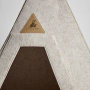 Close-up of Nooee Pet Teepee Tucker entrance with leather logo patch