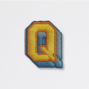 Nooee Pet embroidered patch – letter Q in yellow and blue