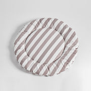 Flat-lay of Nooee Pet Replacement Cushion in beige and white stripes, showcasing its round shape and plush design against a clean white background.