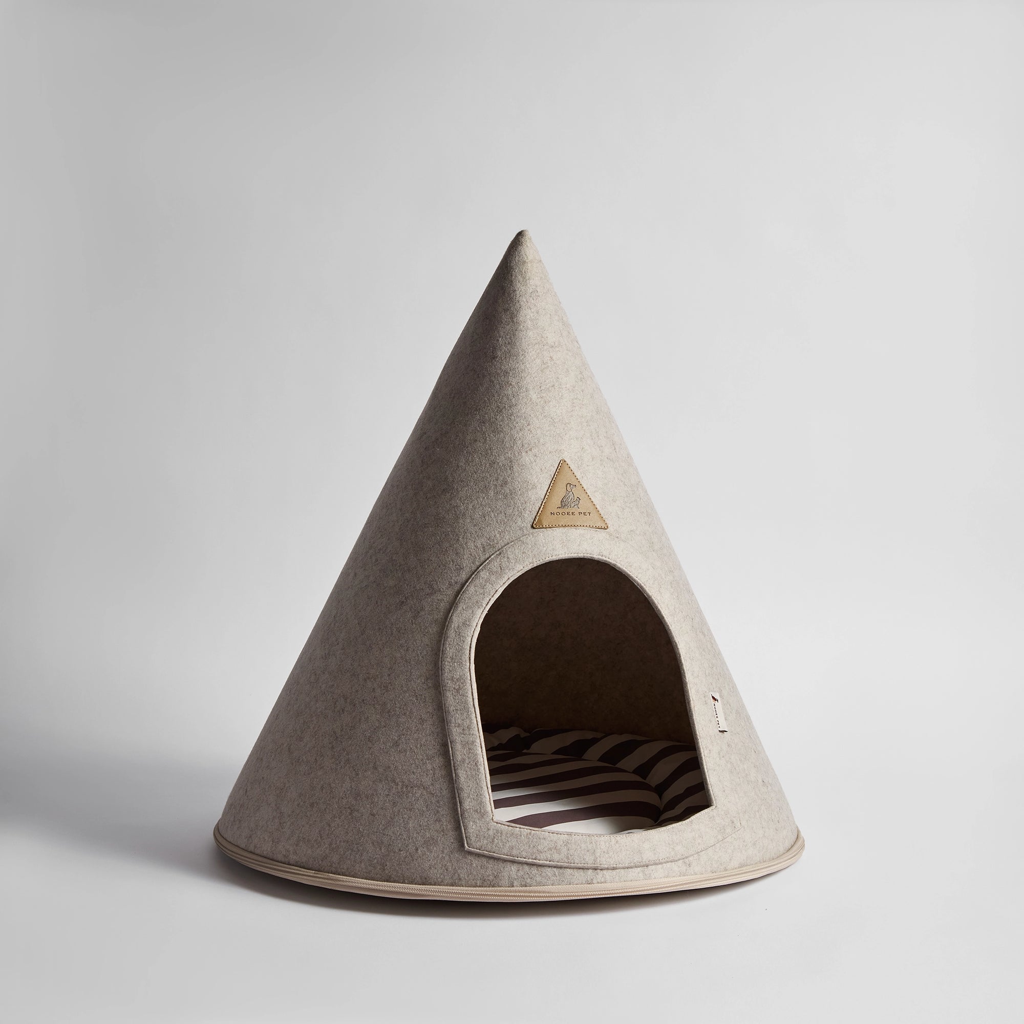 Side view of the pet cave showing its seamless zippered construction.