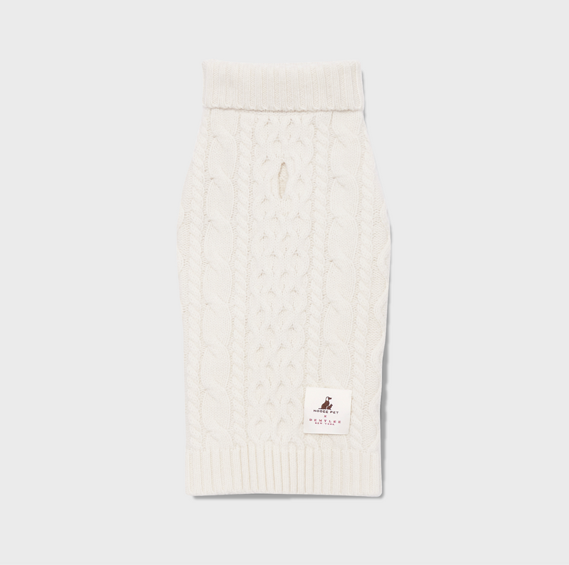 Front view of Nooee Pet Off White Wool Cable Sweater featuring a classic cable knit pattern, ribbed trim, and a collar/harness hole near the neckline.