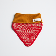 Nooee Pet red wool dog neck warmer with amber ribbed collar, displayed flat on a white background, featuring a geometric knit pattern and Nooee Pet label.
