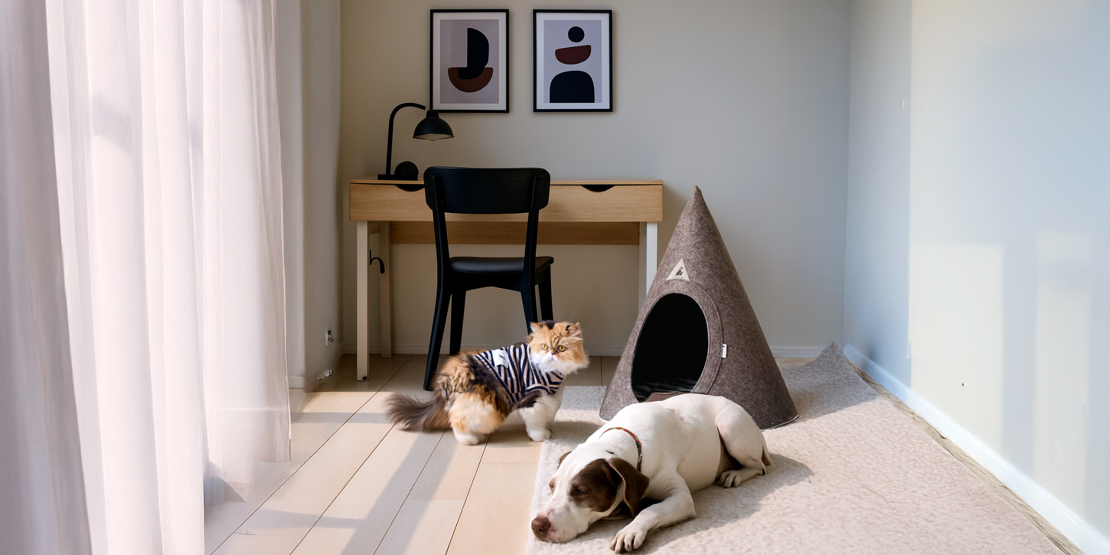 Cat in striped sweater and dog resting beside the brown Nooee Pet cave in a cozy fall setting with soft morning light