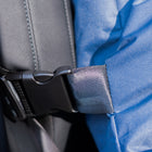 Close-up of the Nooee Pet Car Seat Charlie's safety strap securely fastened around a vehicle seat, highlighting the strong buckle and durable nylon webbing for reliable pet travel protection.