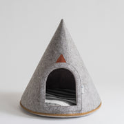 Front view of Nooee Pet Cave Bella (XS) in gray felt with striped cushion
