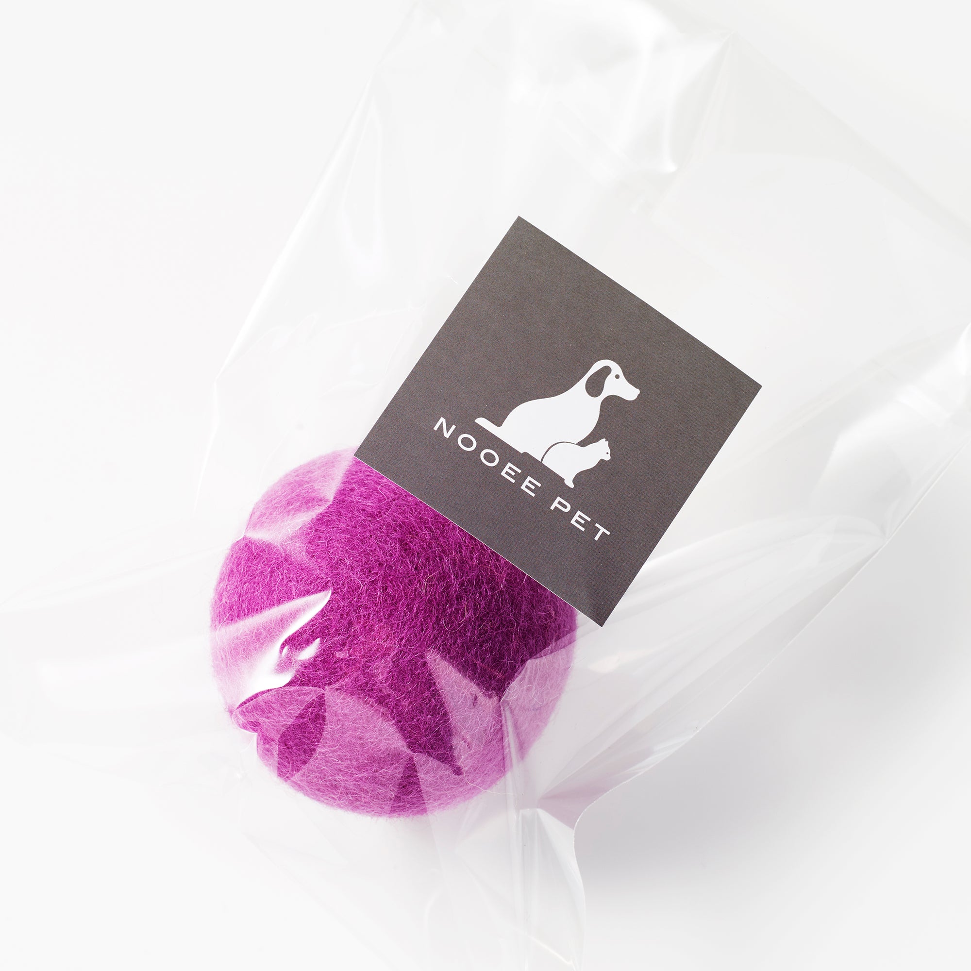 Hot Pink wool toy ball in clear packaging