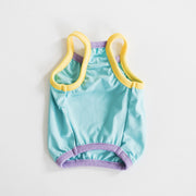 Back view of the Nooee Pet CoolPaws Summer Shirt in blue with yellow and purple trim, showcasing its lightweight and breathable cooling fabric.