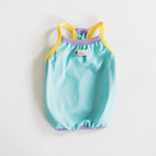 Front view of the Nooee Pet CoolPaws Summer Shirt in blue with yellow and purple trim, featuring a Nooee Pet logo tag at the center neckline.