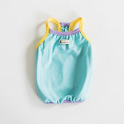 Front view of the Nooee Pet CoolPaws Summer Shirt in blue with yellow and purple trim, featuring a Nooee Pet logo tag at the center neckline.